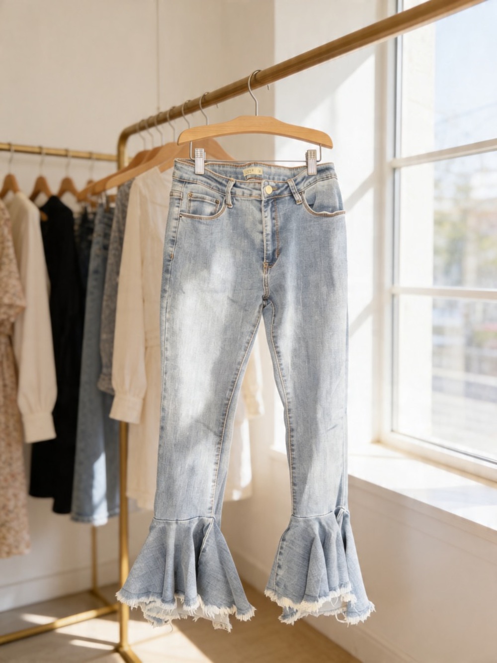 Light Wash Flared Ruffle-Hem Jeans by